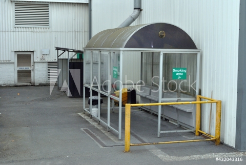 Deserted Steel & Plastic Smoking Shelter in Factory Yard